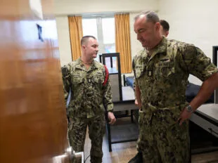 Master Chief Petty Officer of the Navy (MCPON) John Perryman tours the King Hall officer candidate dormitory