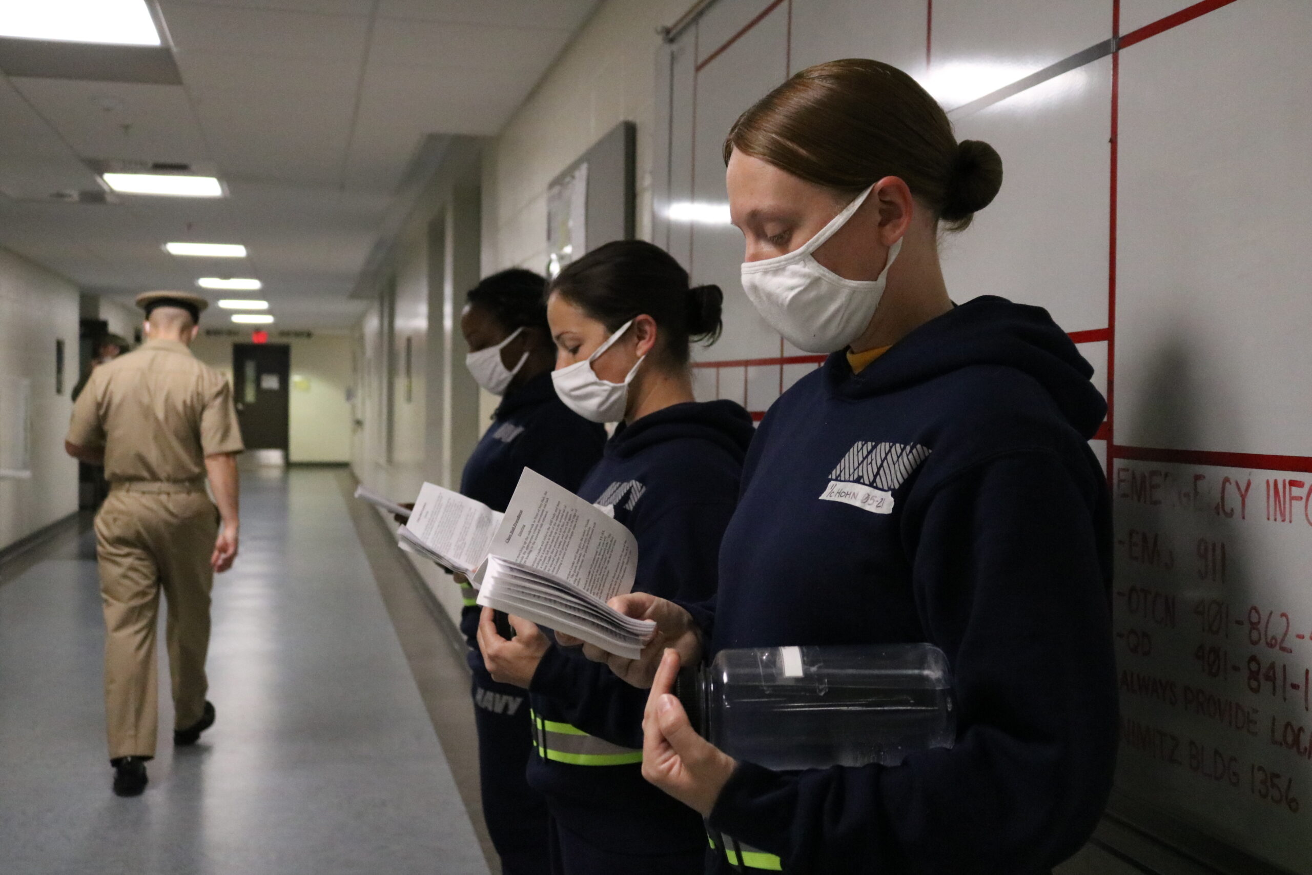 An officer candidate studying SCRA materials