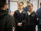Sailors assigned to the Virginia-class fast-attack submarine USS Washington (SSN 787) inspect Port Angeles High School NJROTC students during