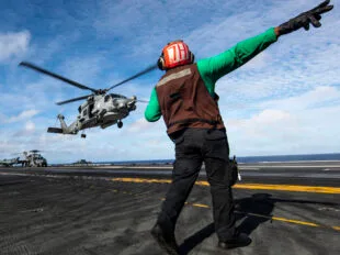An MH-60R Seahawk, attached to Helicopter Maritime Strike Squadron (HSM) 77