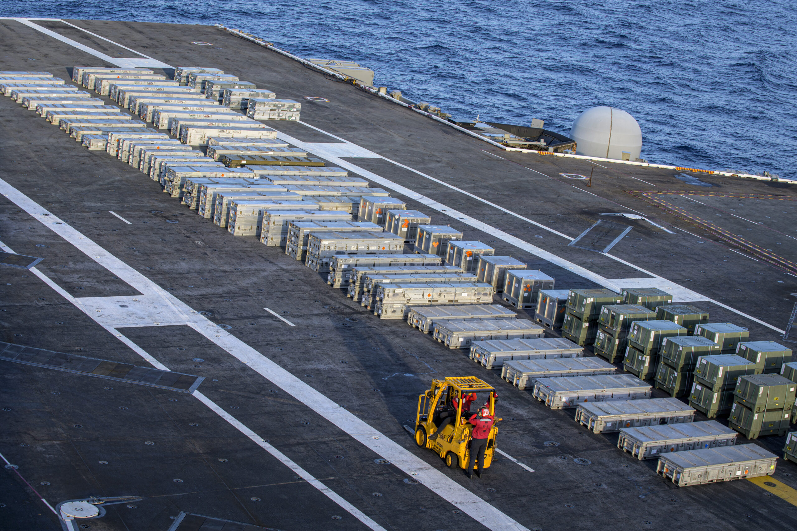 An aircraft carrier where intel officers may serve