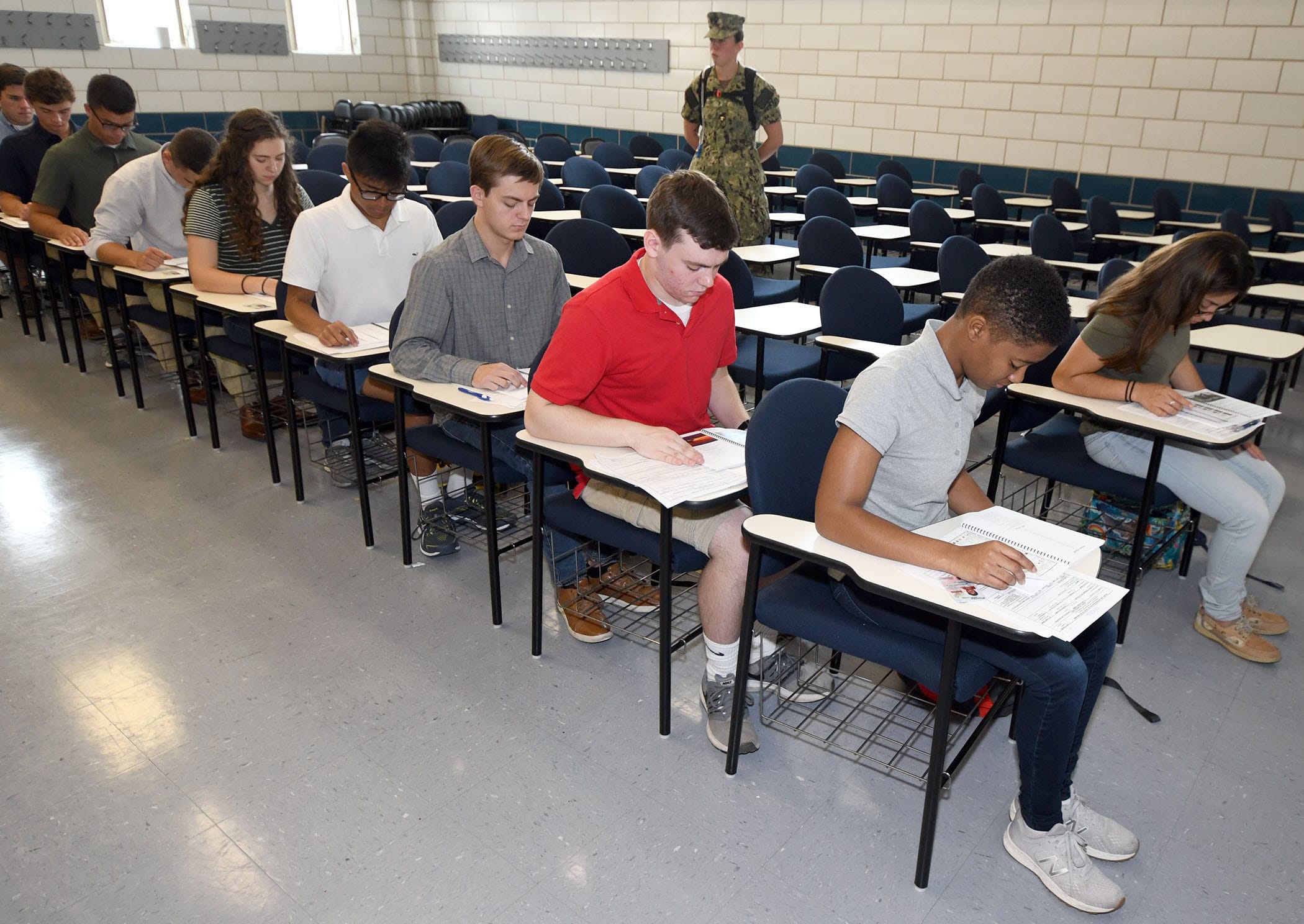 A candidate reviewing study materials for the OAR