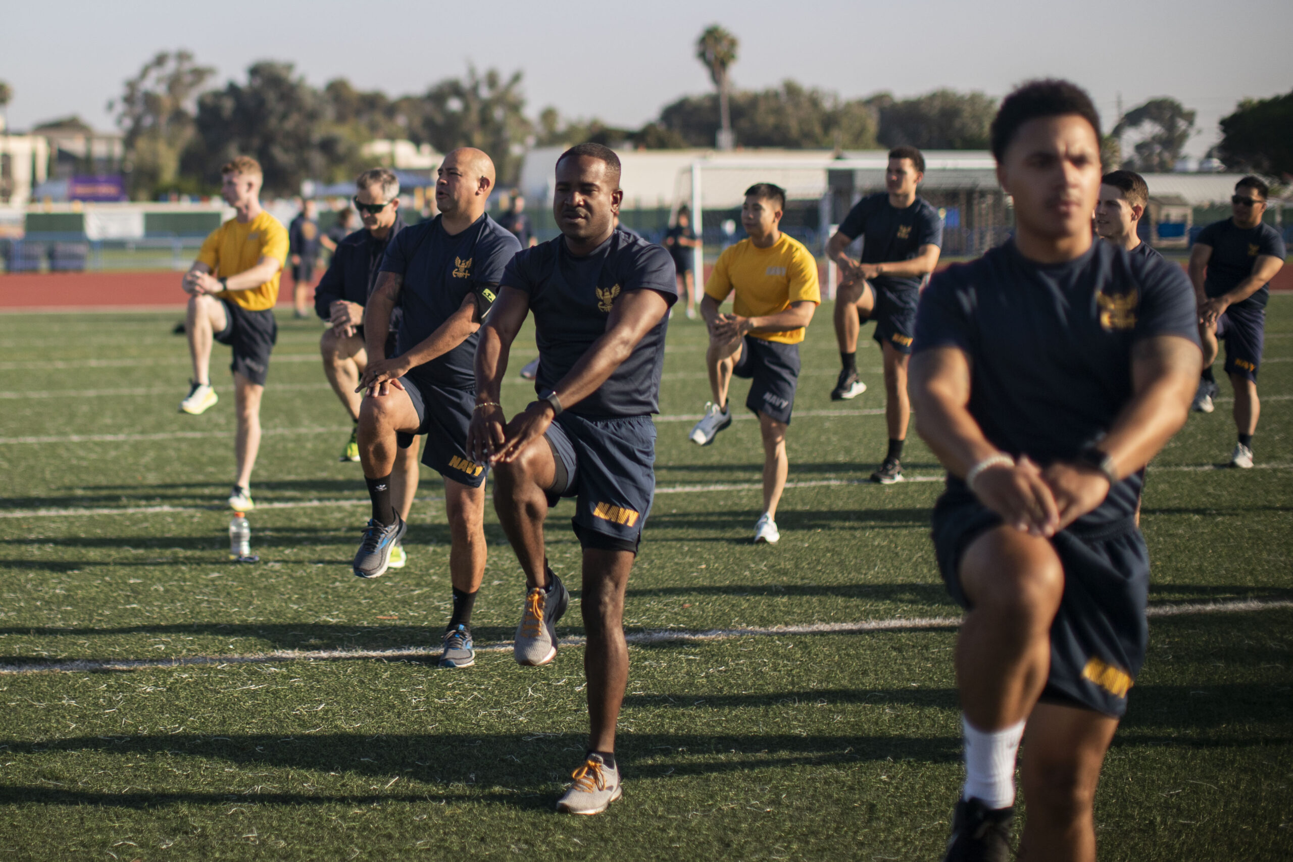 Officer candidates performing push-ups during a PRT