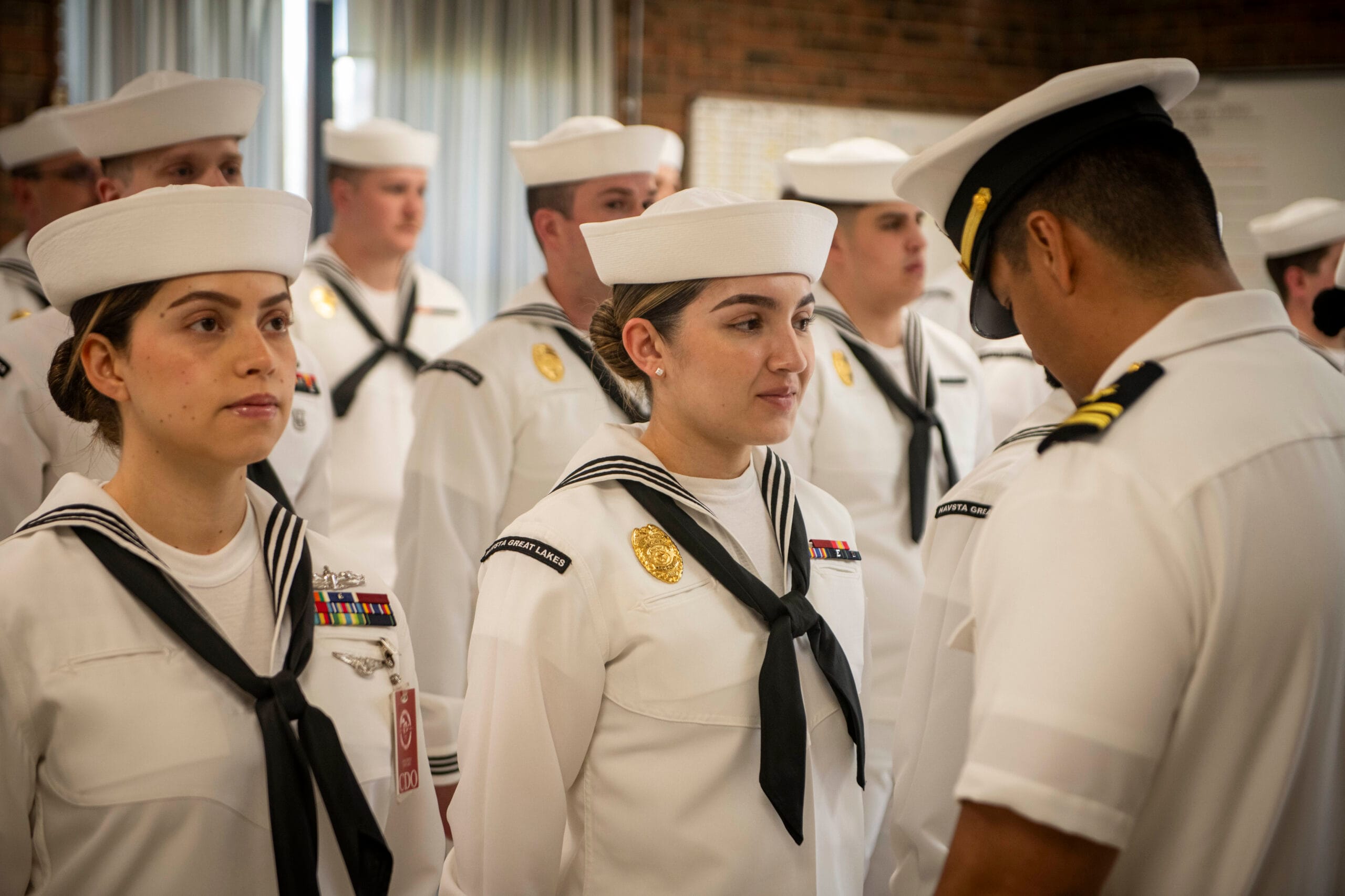 Navy officer in dress uniform smiling