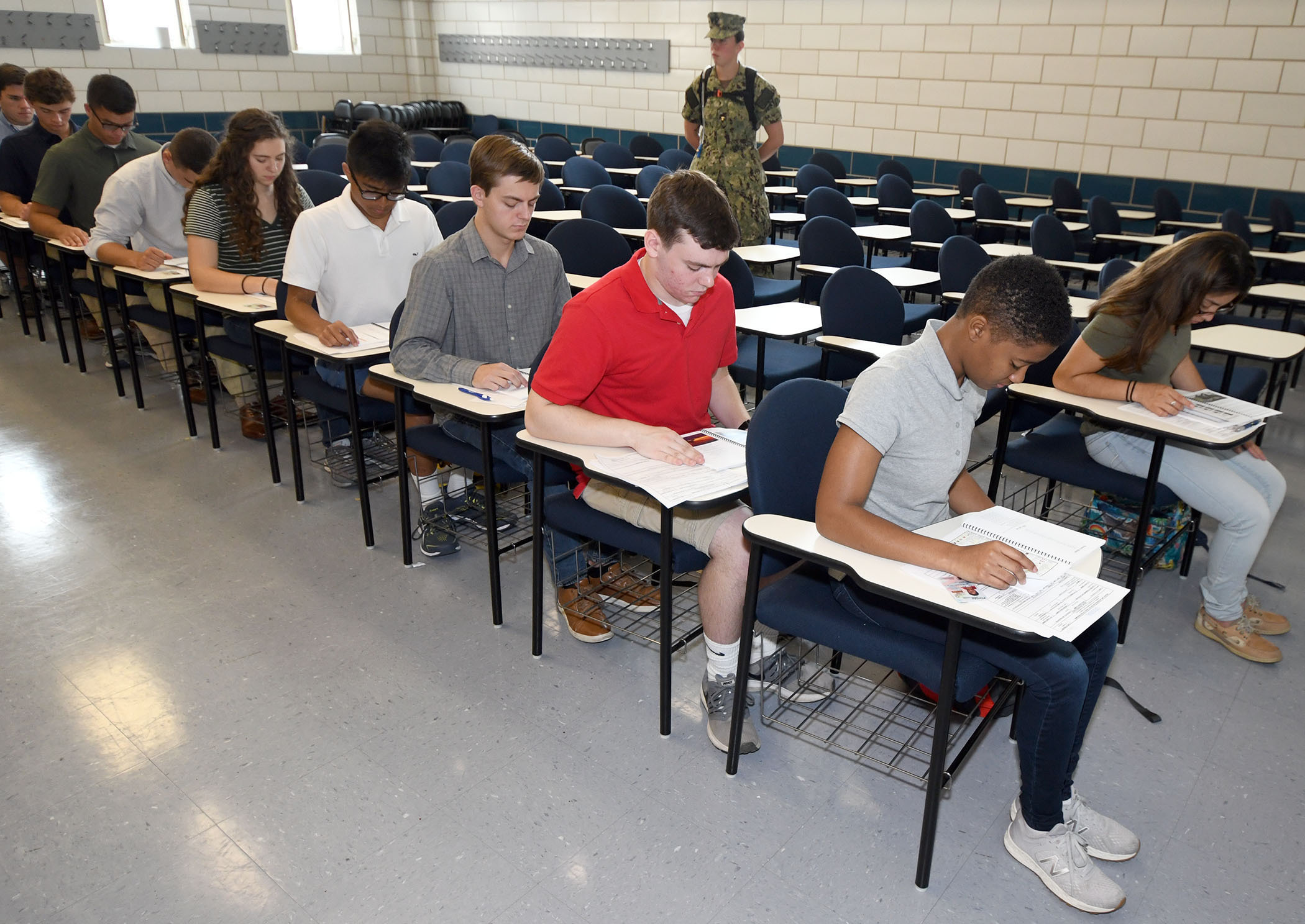 Candidate reviewing study materials for the ASTB/OAR test