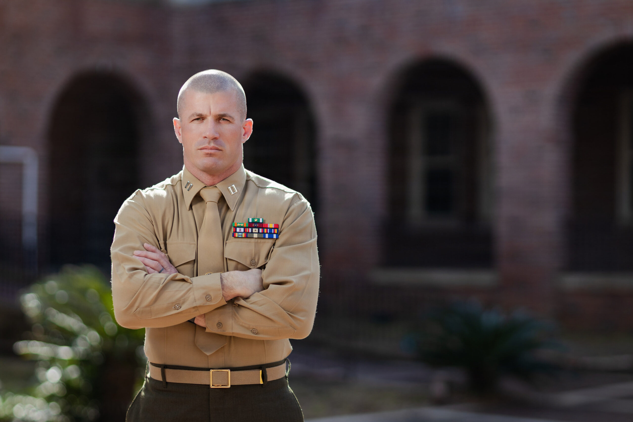 Naval officer in service dress blues smiling