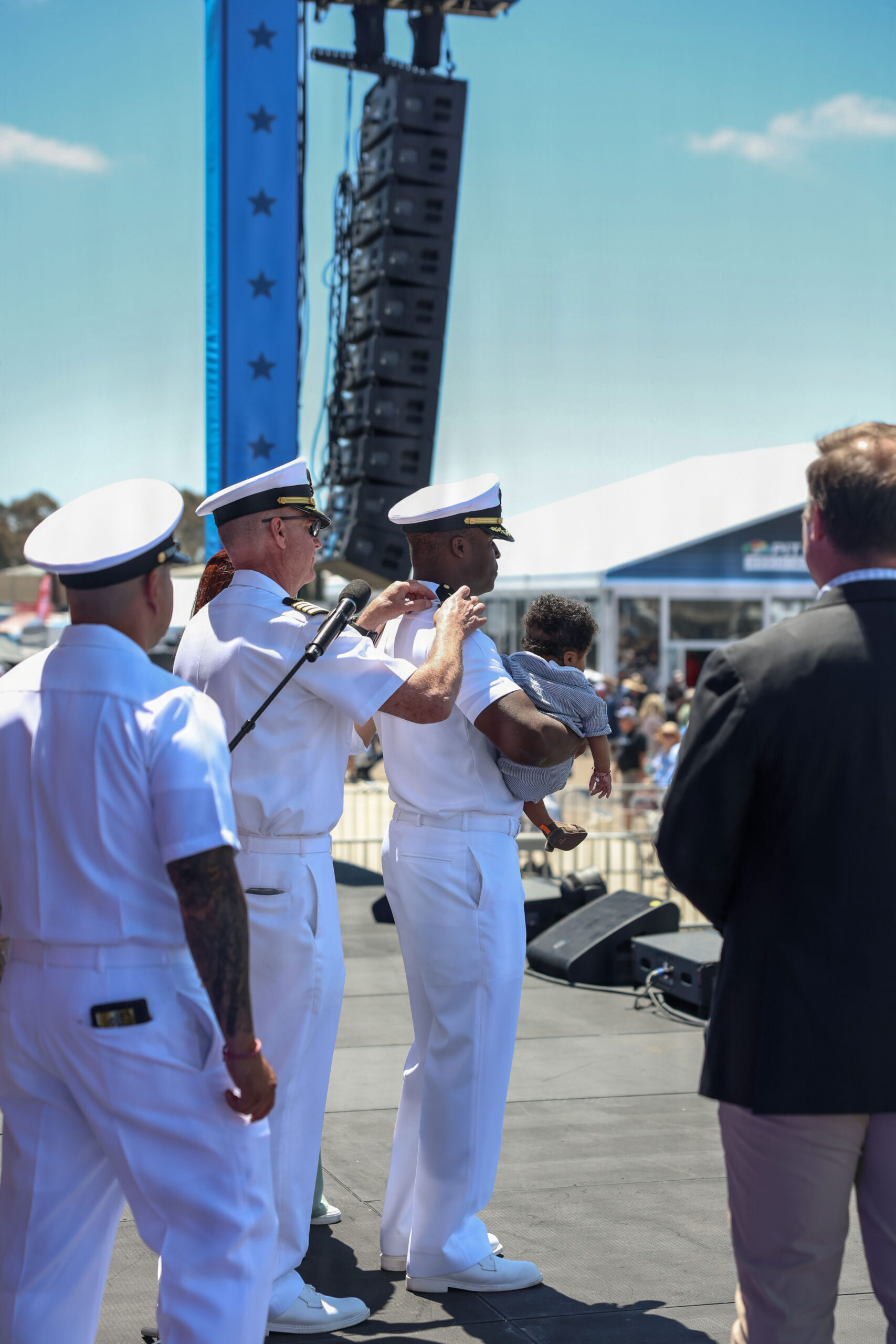 Officers standing at attention during a promotion ceremony