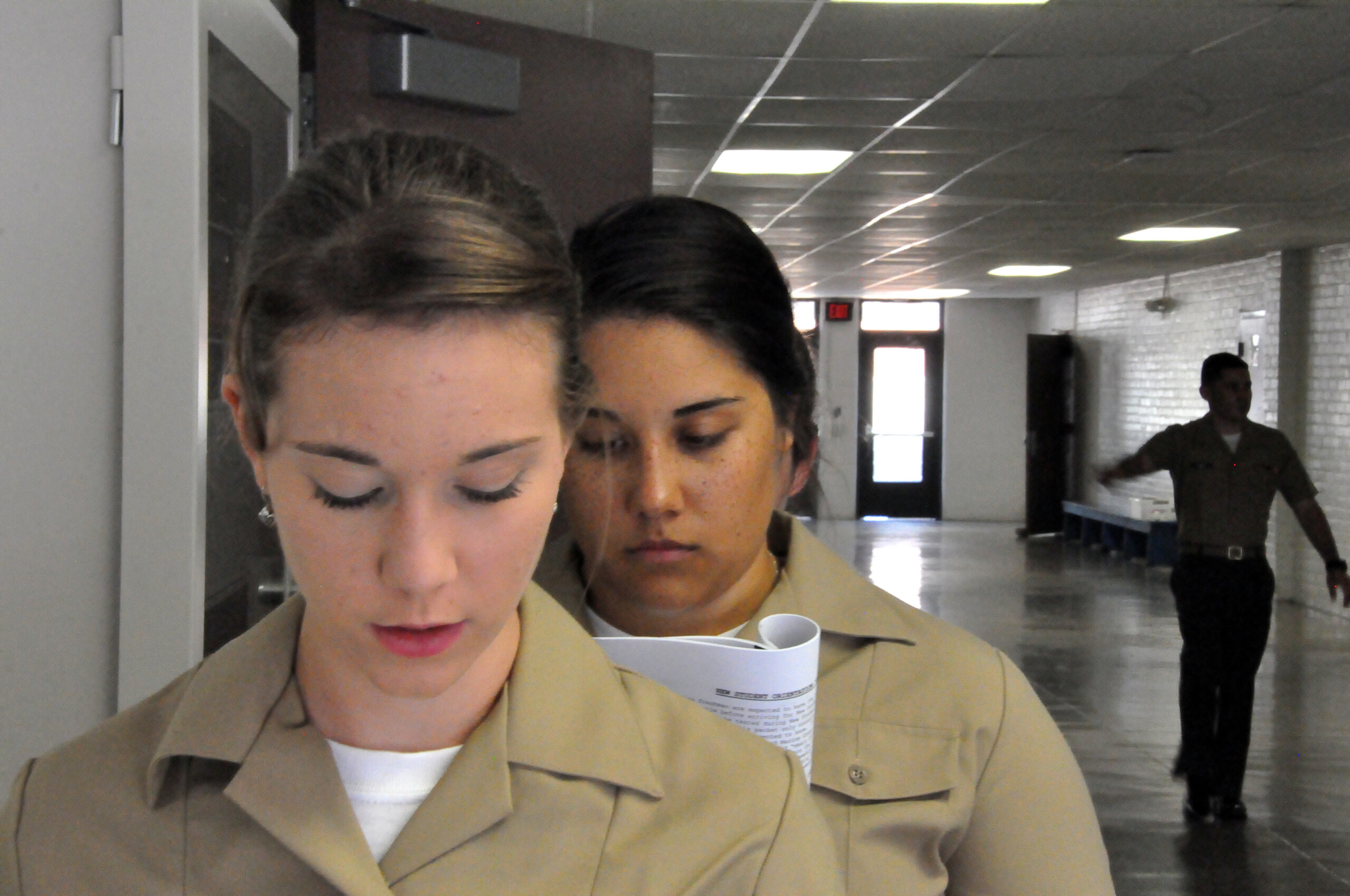 A candidate reviewing study materials before the ASTB-E