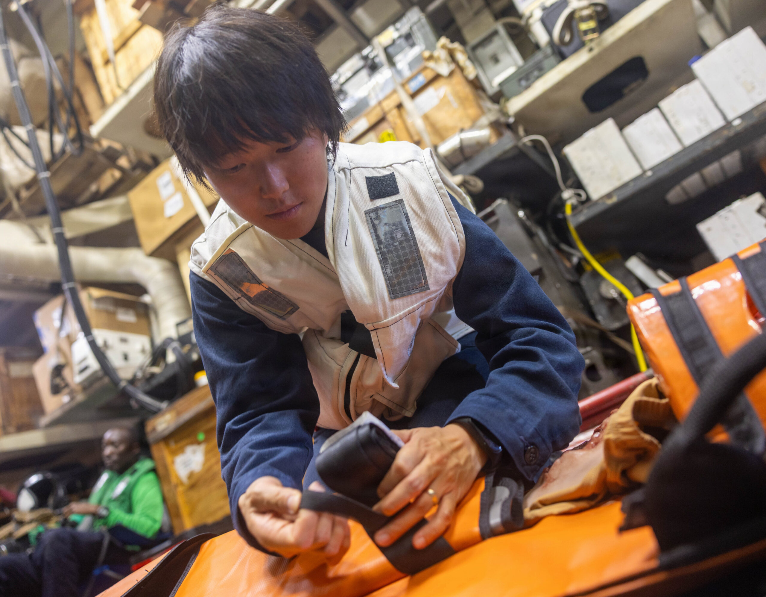 Navy medical staff caring for a newborn