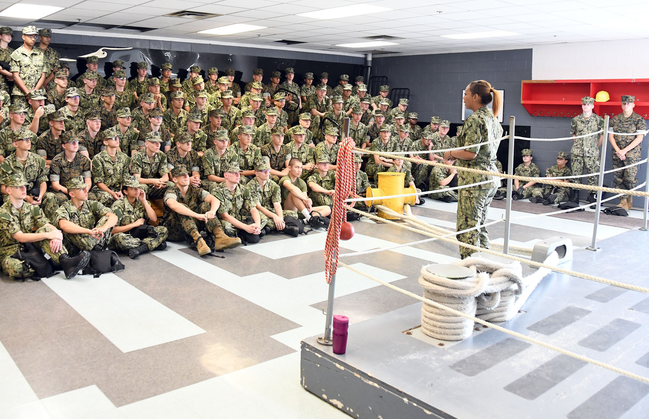 Officer candidates studying and reviewing materials in a classroom