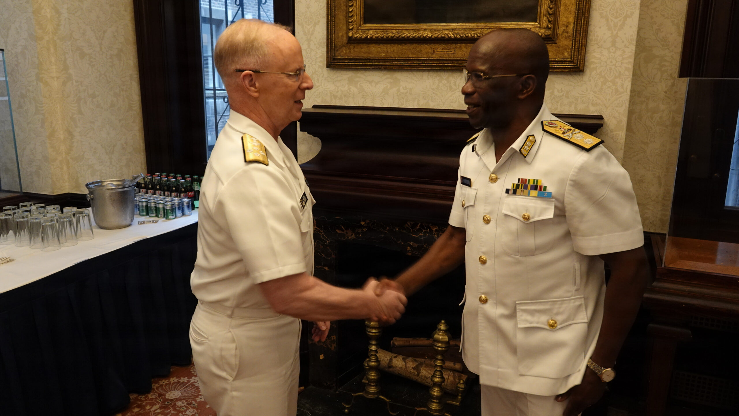 A naval officer in dress blues, representing the professional military investor
