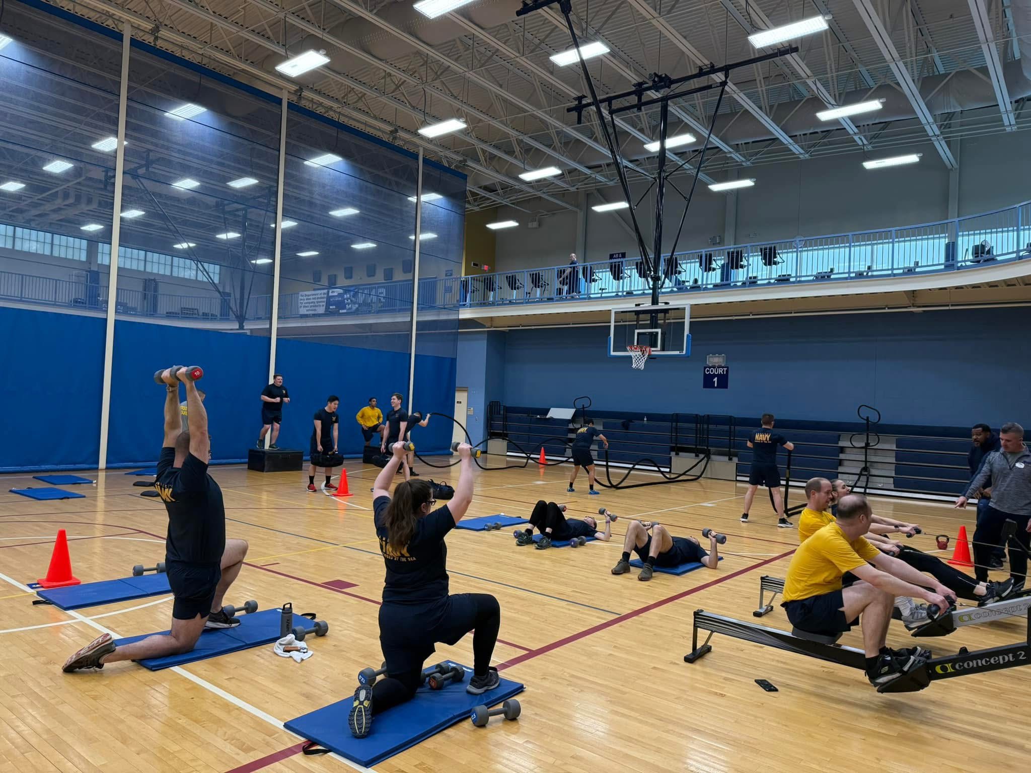 Sailors doing push-ups during a PT session