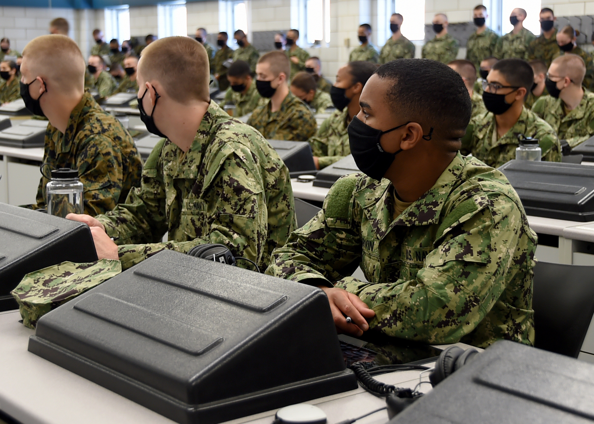 Officer candidates studying in a classroom at OCS