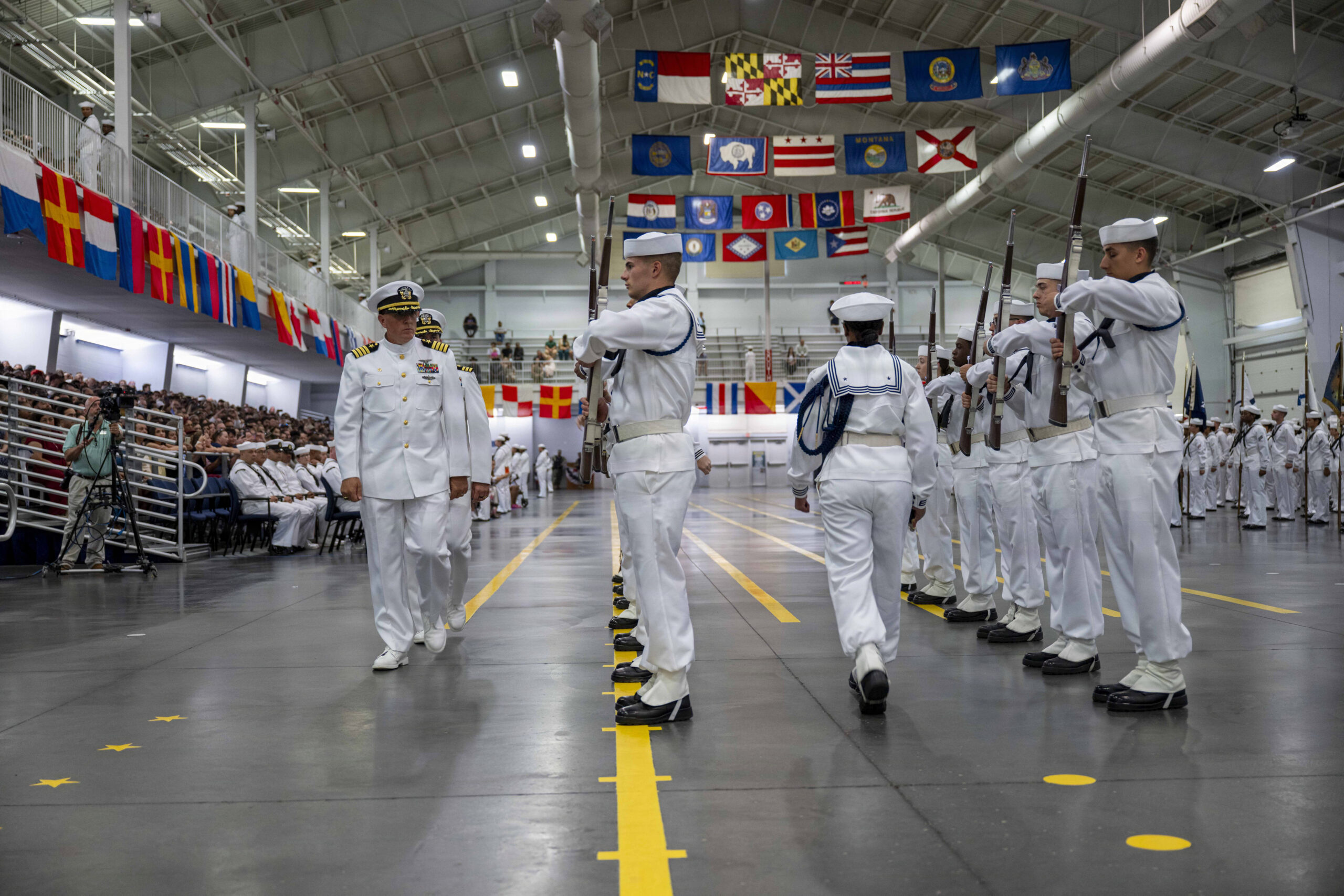 A Navy recruiter talking with a potential candidate