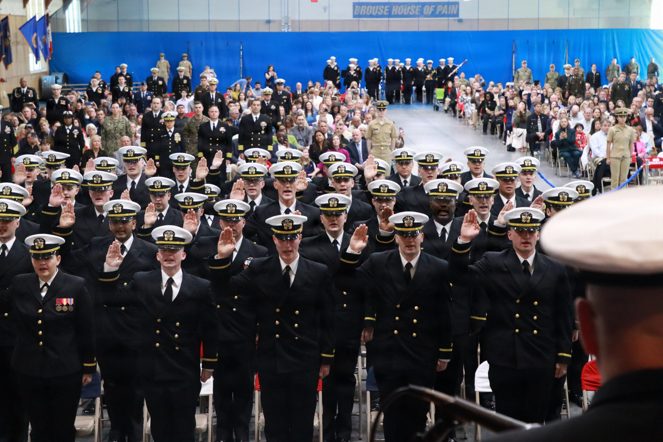 Officer candidates celebrating graduation at Navy OCS in Newport