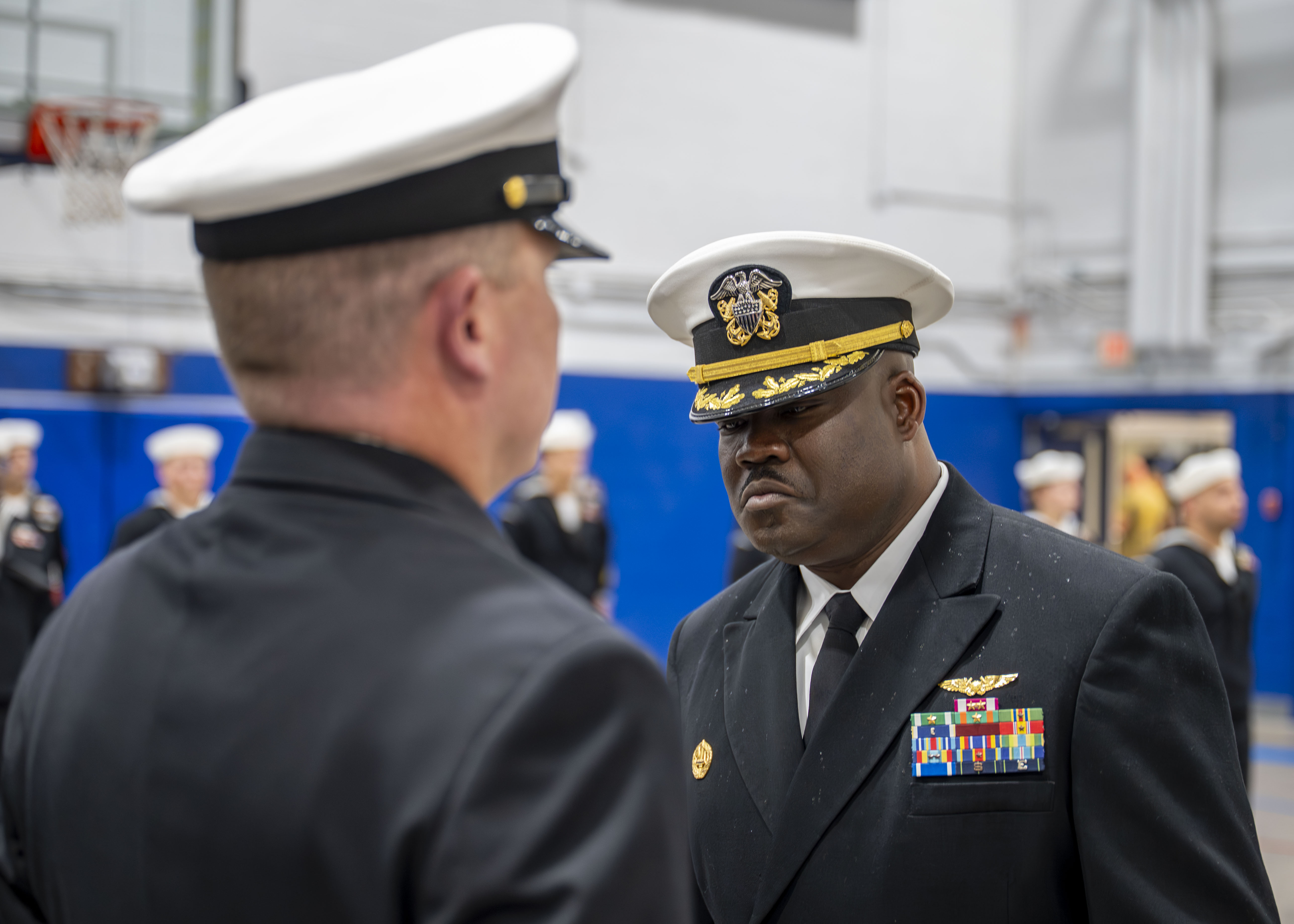 Sailors standing a uniform inspection