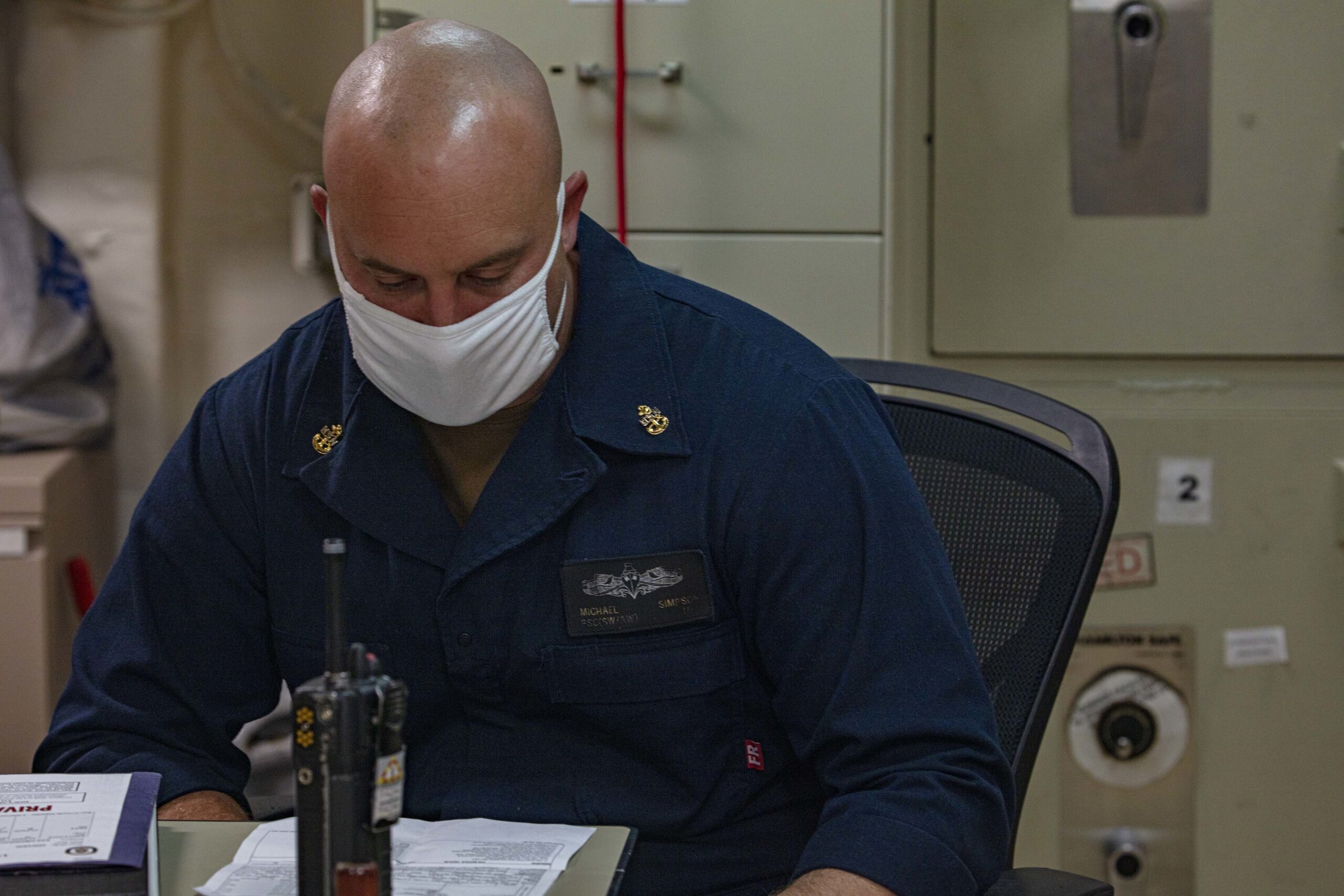 Sailors work in the personnel office
